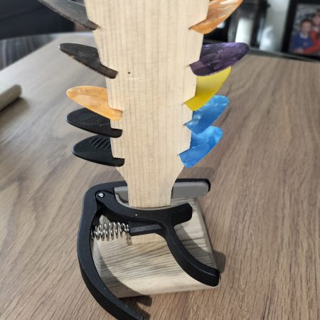 Guitar head stock pick holder