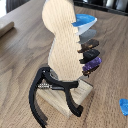 Guitar head stock pick holder