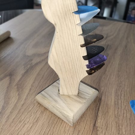 Guitar head stock pick holder