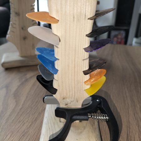 Guitar head stock pick holder