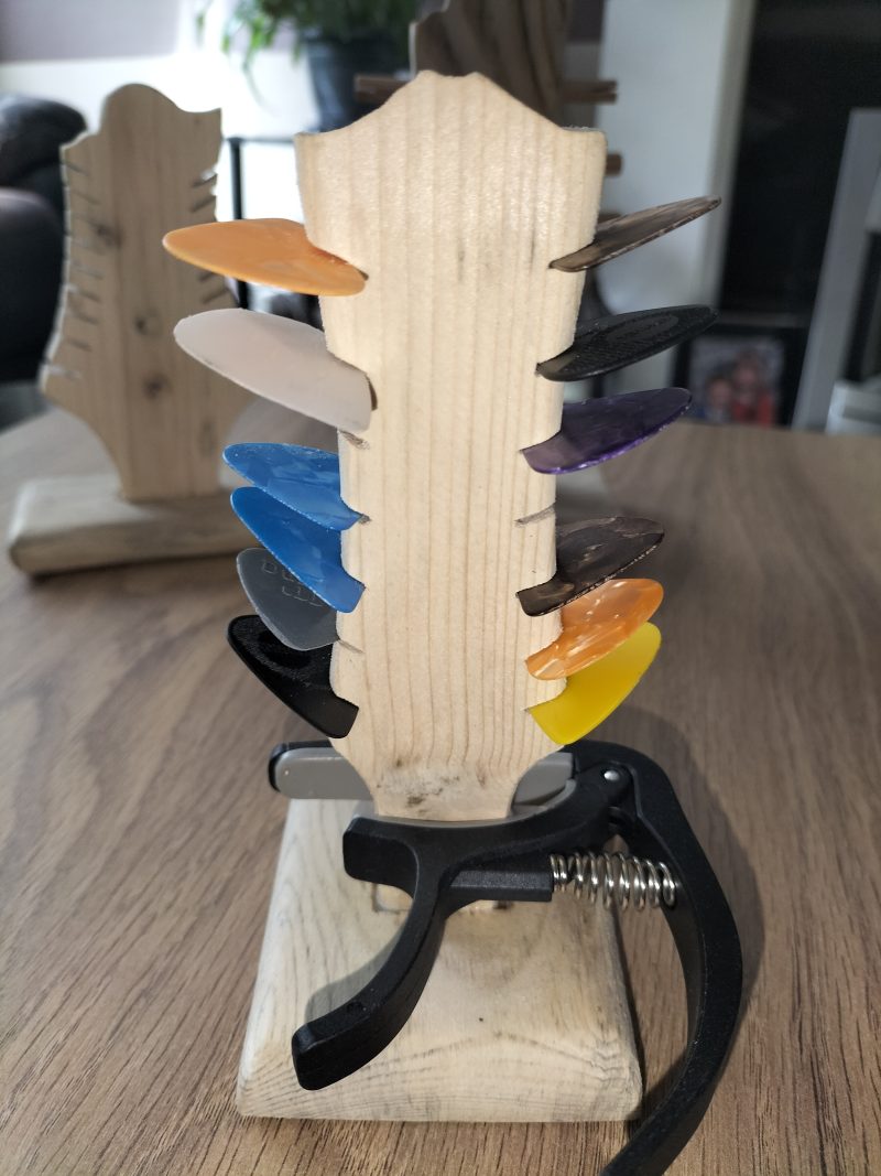 Guitar head stock pick holder