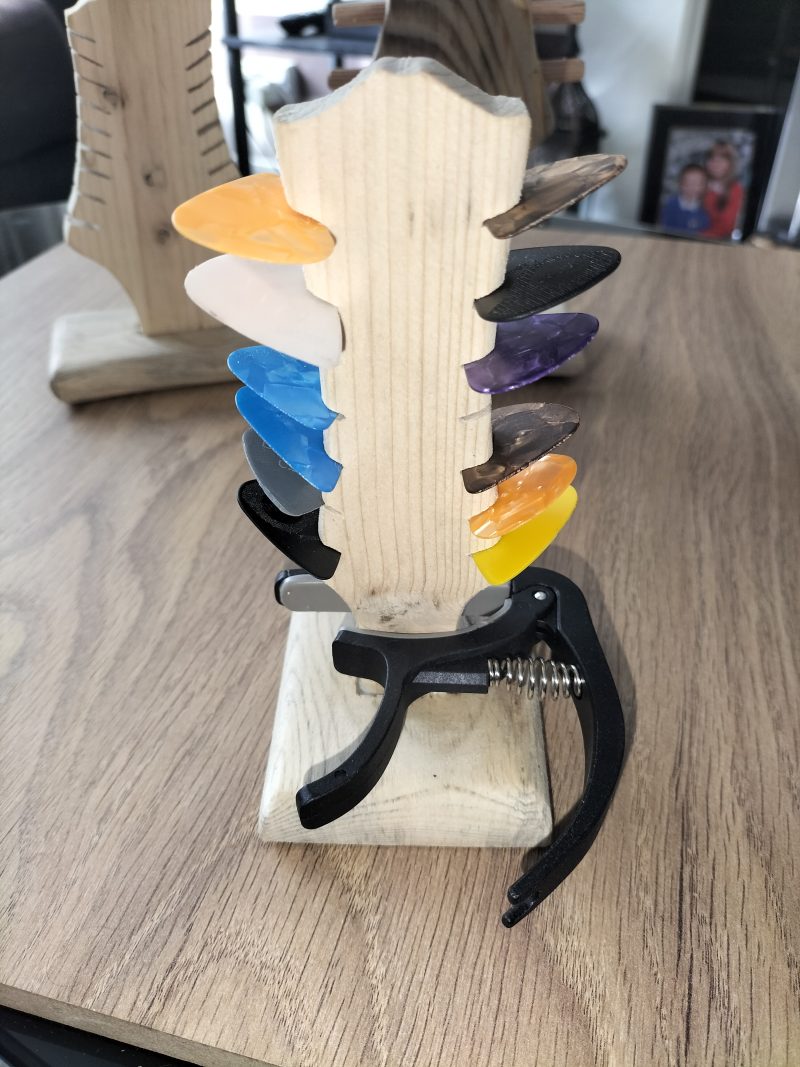 Guitar head stock pick holder
