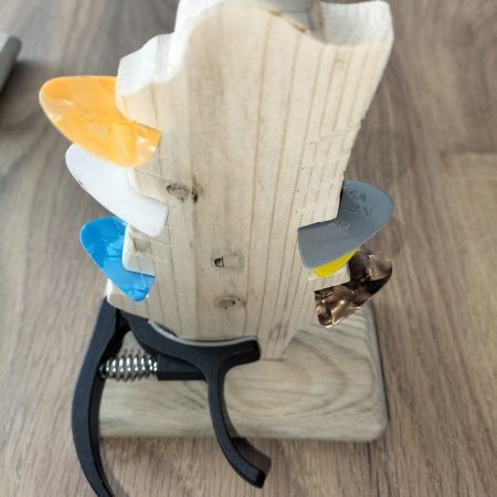 Guitar head stock pick holder