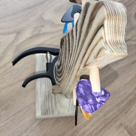 Guitar head stock pick holder