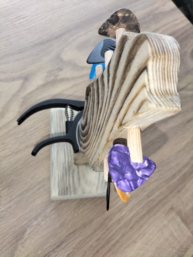 Guitar head stock pick holder