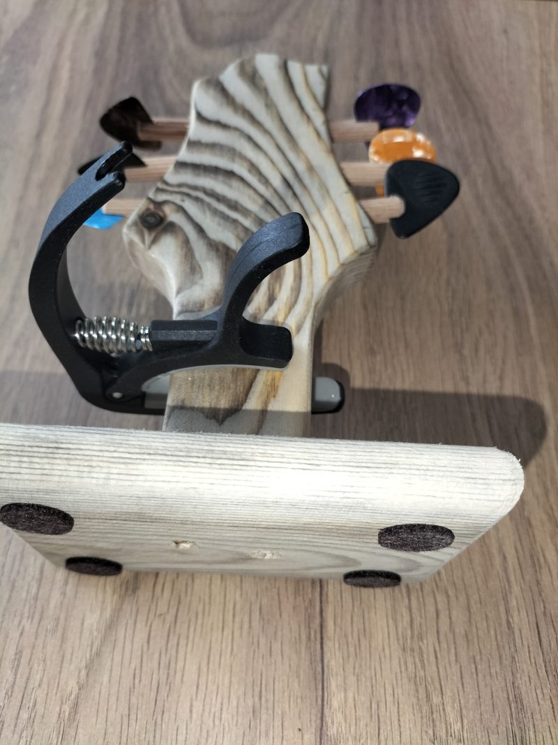 Guitar head stock pick holder