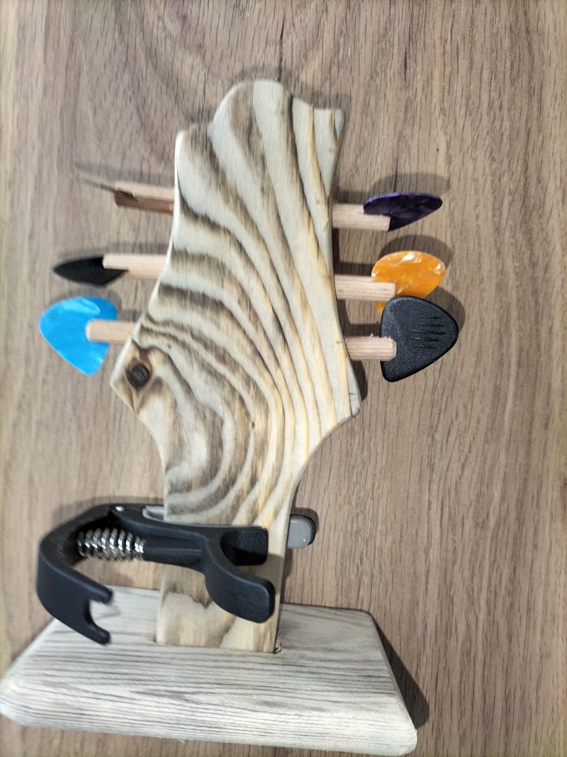Guitar head stock pick holder