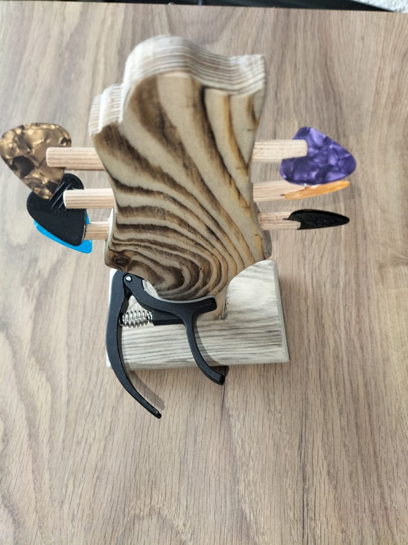 Guitar head stock pick holder