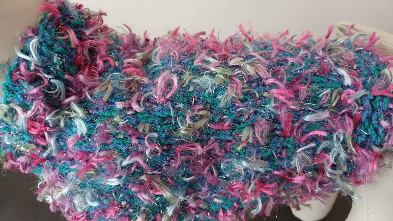 Hand Knitted Small Dog Coat Jade Green With Pinks And Blue Ribbon Tufts