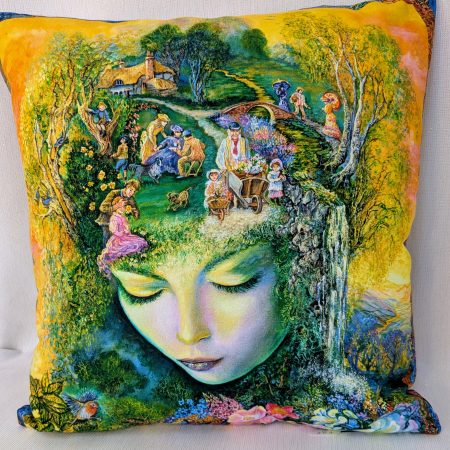Summer garden fantasy art cushion within the face of Nature goddess showing a village green scene, flowers, butterflies and birds, colourful fantasy decorative pillow