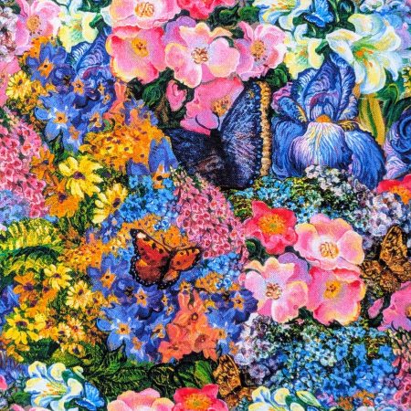 Close up of Summer Dreamscape Goddess 18" 45 cm cotton cushion cover showing cottage garden style flowers, butterflies and birds, colourful fantasy decorative pillow