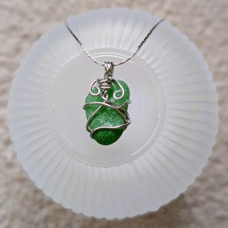 Cornish green sea glass necklace in stainless steel wire