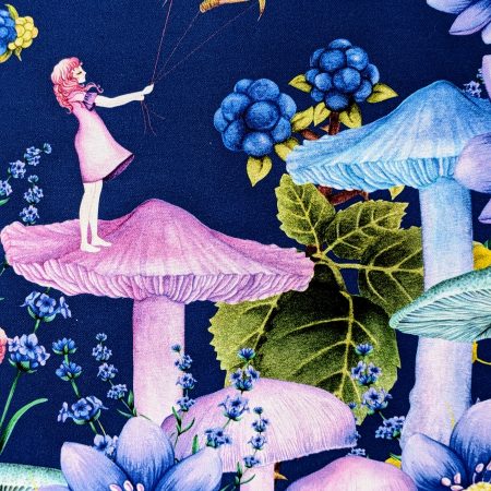 Close up of detail of the illustrated cushion cover featuring a girl standing on a mushroom holding berry shaped balloons surrounded by flowers and butterflies on a navy background.