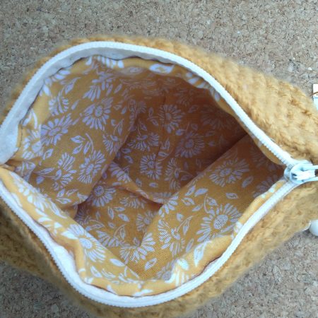 Handmade crochet purse, fully lined with zip fastening. Mustard main colour with flower cotton lining