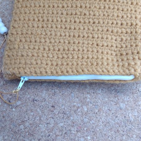 Handmade crochet purse, fully lined with zip fastening. Mustard main colour with flower cotton lining