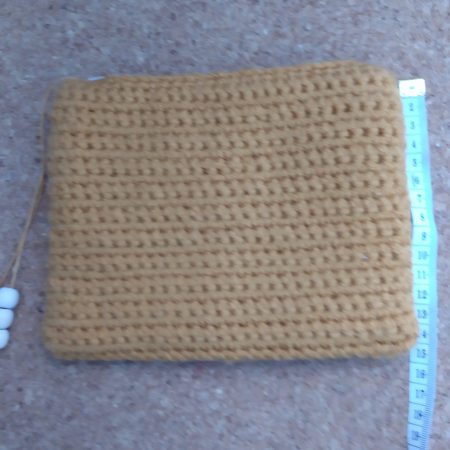 Handmade crochet purse, fully lined with zip fastening. Mustard main colour with flower cotton lining