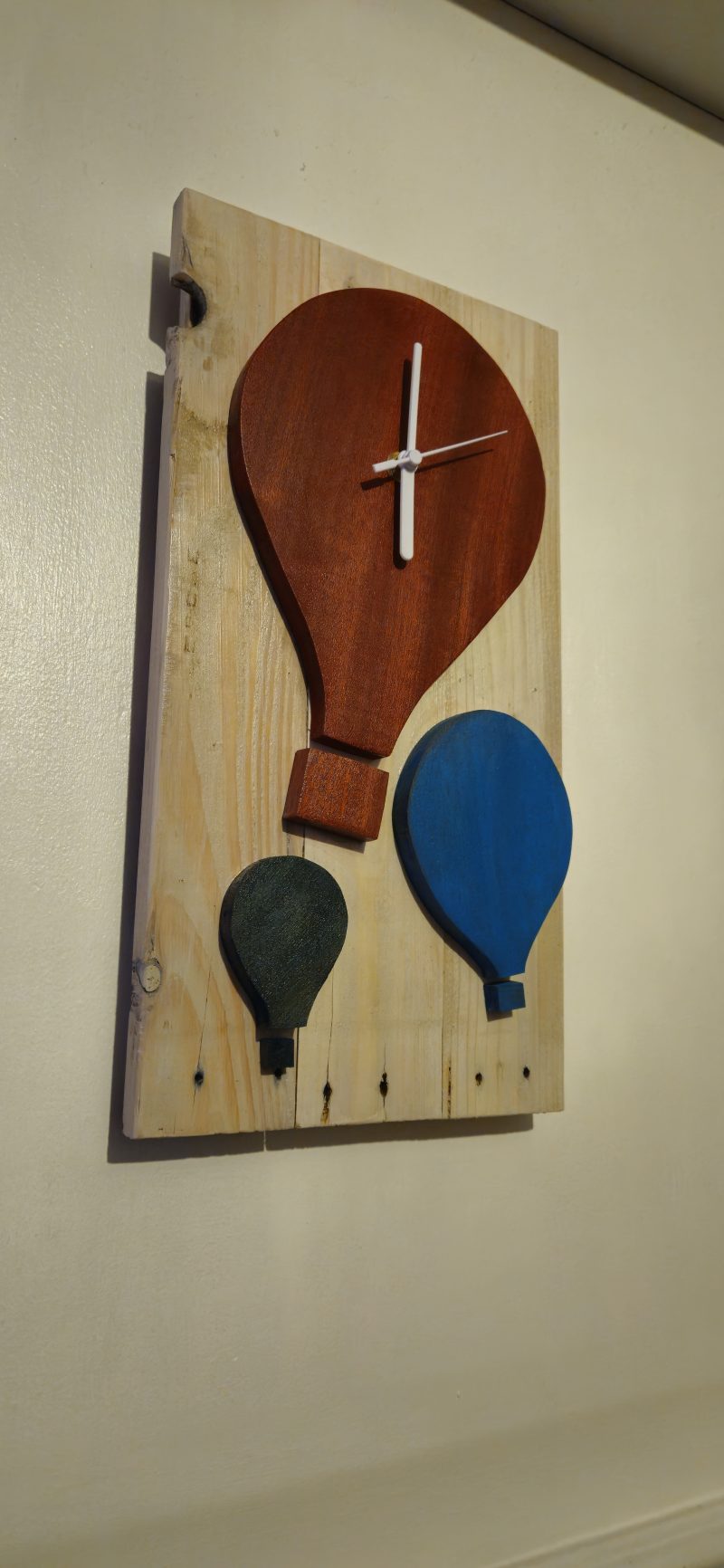Wooden wall clock. Handmade from pallet wood. Air balloon theme. Quartz movement. Battery operated.