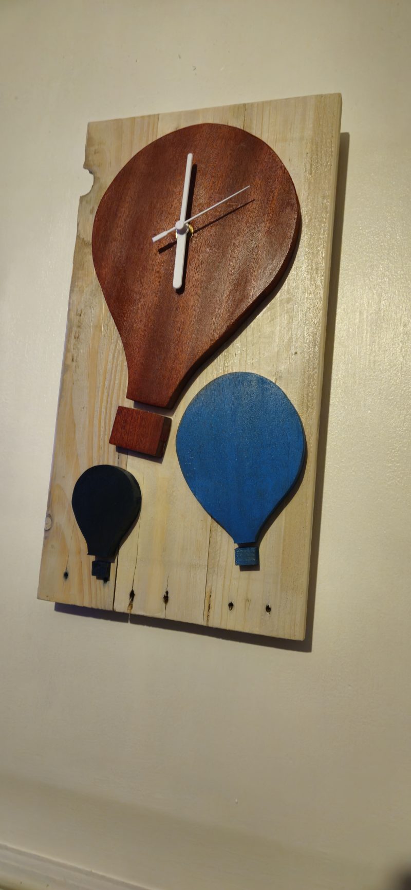 Wooden wall clock. Handmade from pallet wood. Air balloon theme. Quartz movement. Battery operated.
