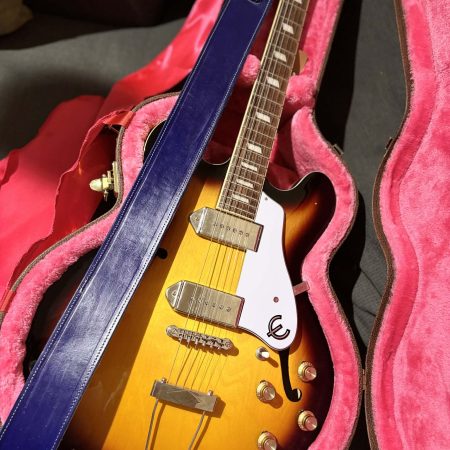 Handmade leather guitar straps available in black, blue and burgundy.