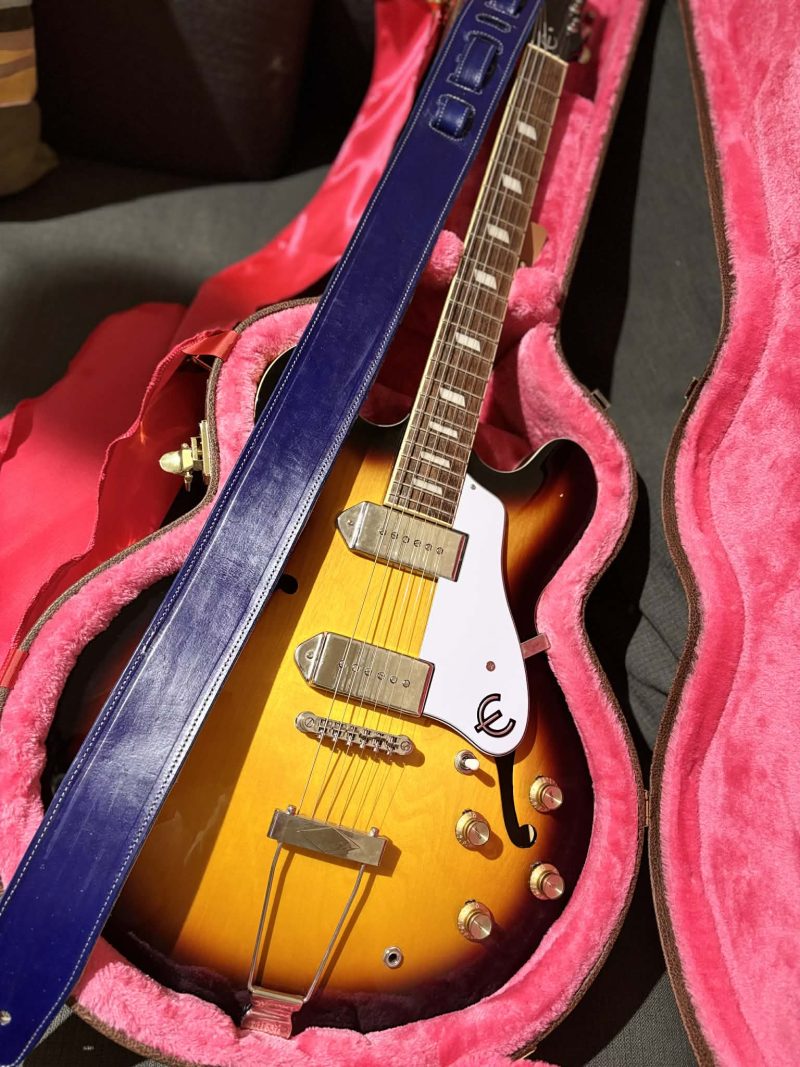 Handmade leather guitar straps available in black, blue and burgundy.