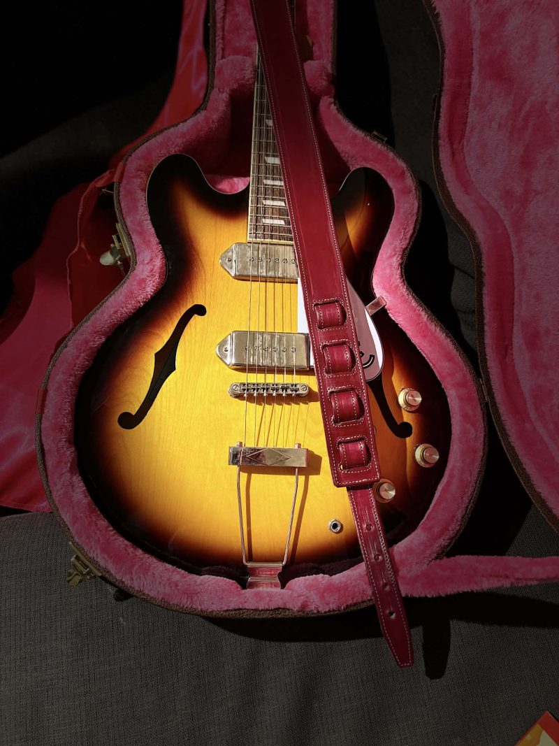 Handmade leather guitar straps available in black, blue and burgundy.