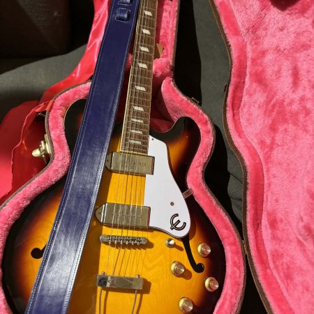 Handmade leather guitar straps available in black, blue and burgundy.