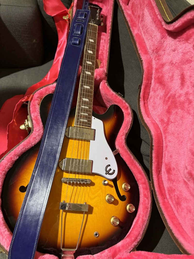 Handmade leather guitar straps available in black, blue and burgundy.