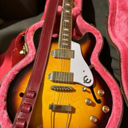 Handmade leather guitar straps available in black, blue and burgundy.