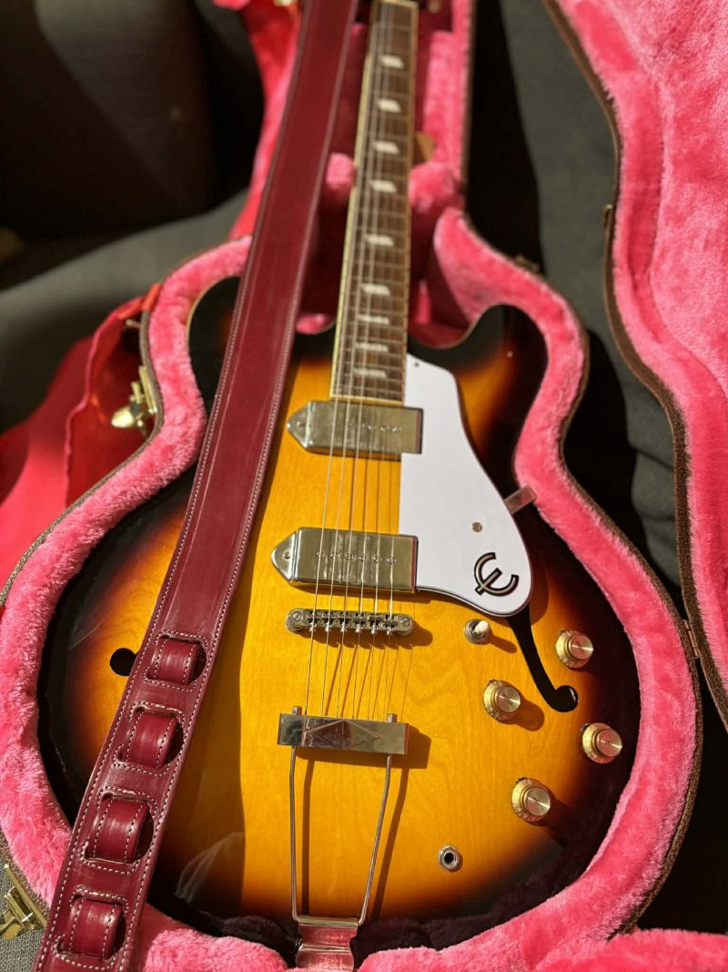 Handmade leather guitar straps available in black, blue and burgundy.