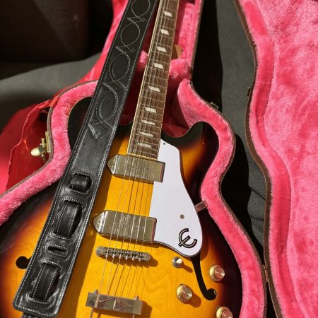 Handmade leather guitar straps available in black, blue and burgundy.