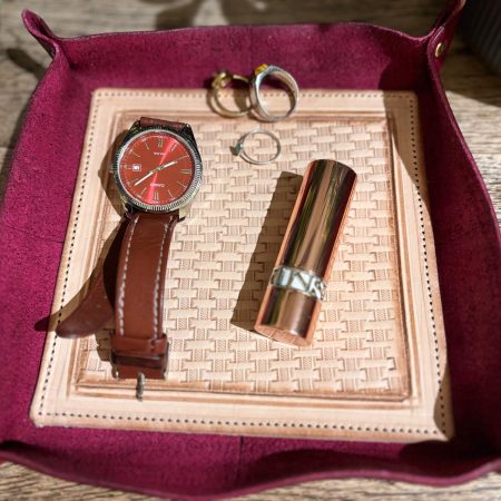 Handmade leather trays, available in black, blue and burgundy.
