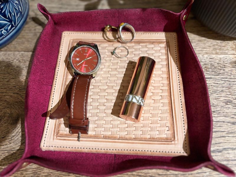 Handmade leather trays, available in black, blue and burgundy.