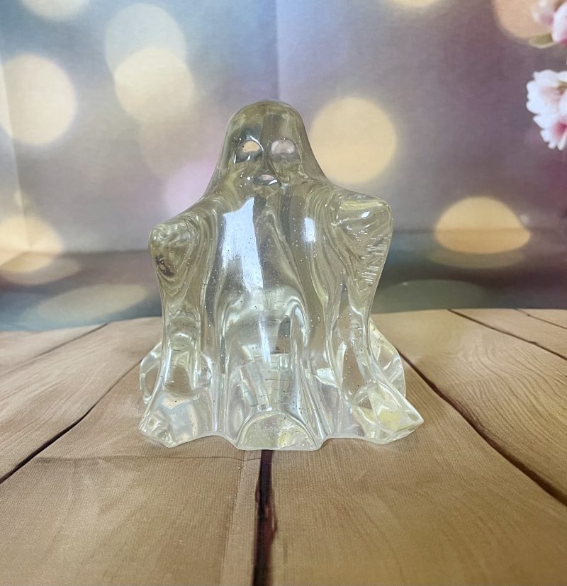 Adorable handcrafted resin ghost ornament. Clear with Silver Glitter.