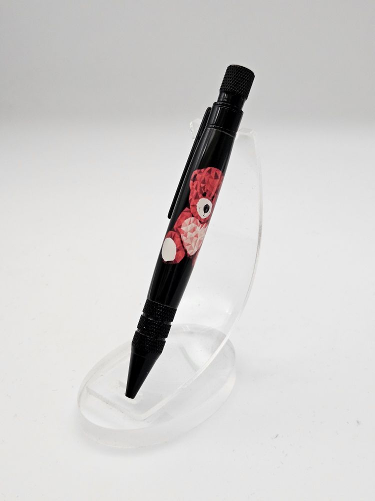 A hand crafted Headwind Twist Pen in Black Chrome and Teddy Design