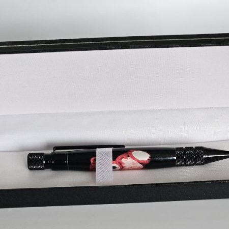 A hand crafted Headwind Twist Pen in Black Chrome and Teddy Design