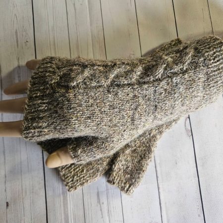 Handknitted fingerless mitts.