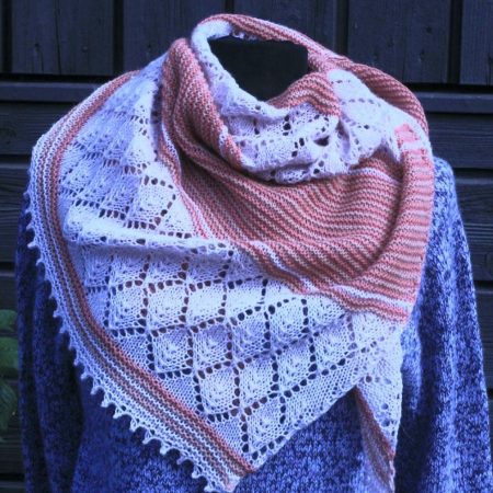 Handknitted shawl.