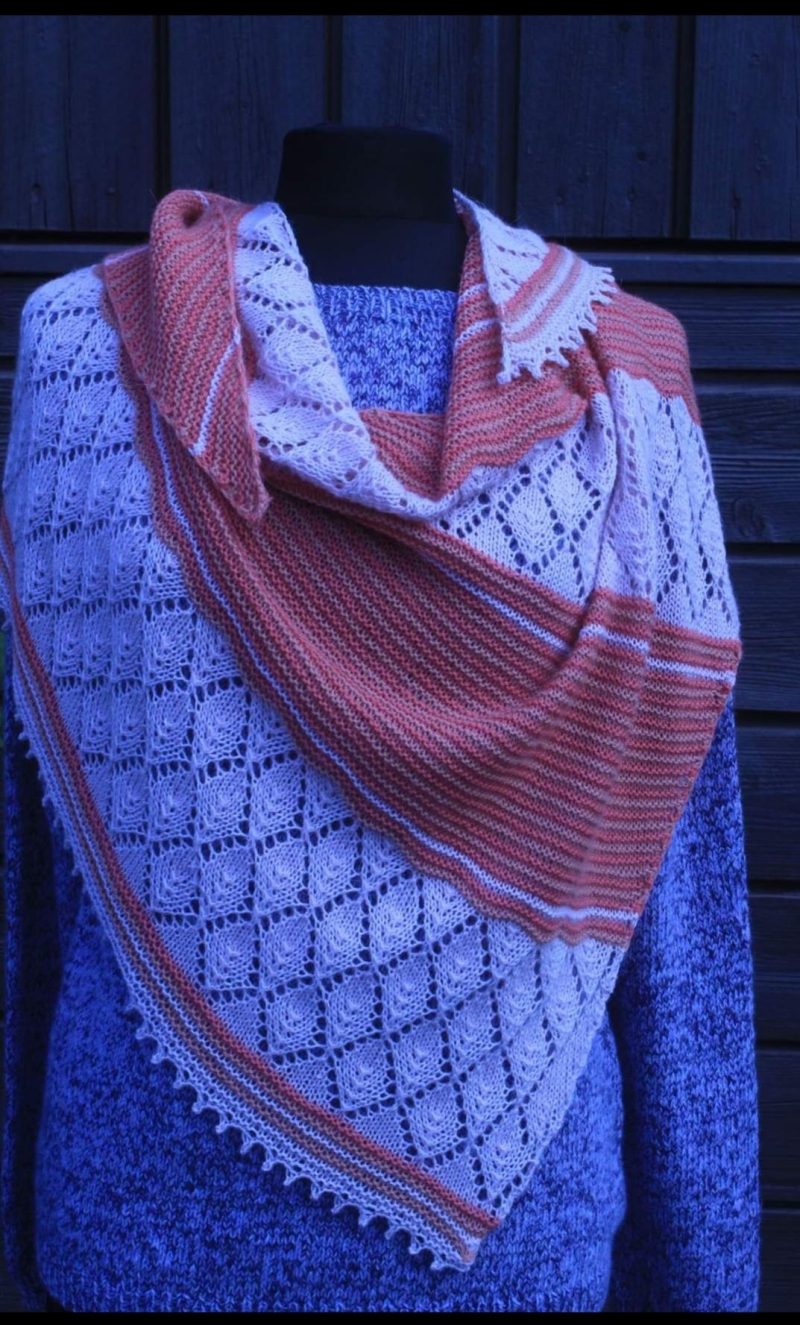 Handknitted shawl.