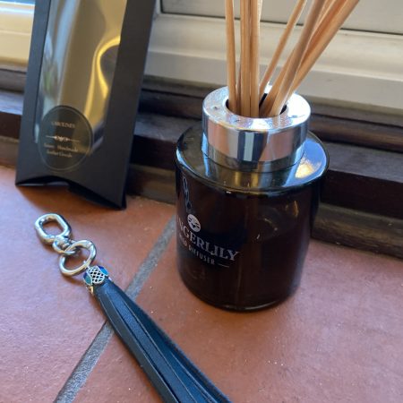 Bag Charm/ tassel italian leather with beautiful tibetan silver and enamel topper