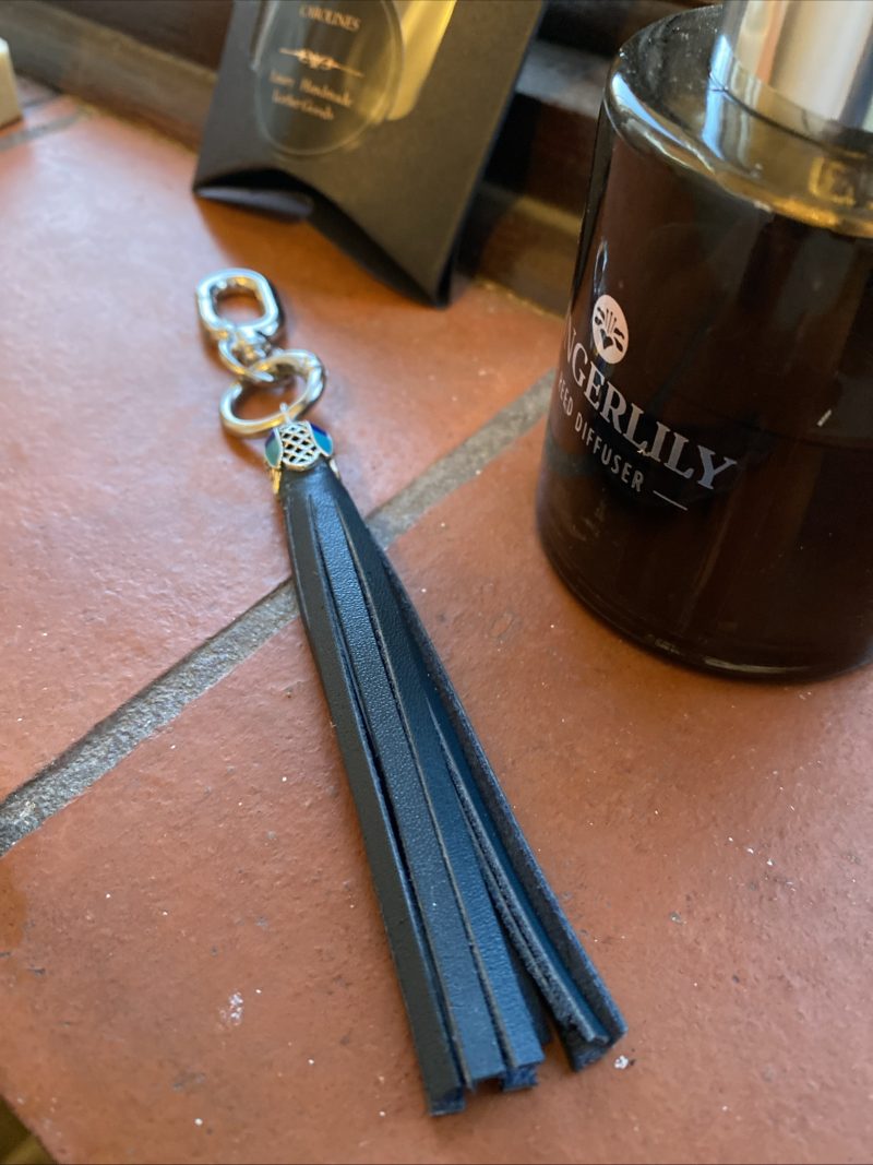 Bag Charm/ tassel handmade Italian leather with stunning enamel and tibetan silver topper