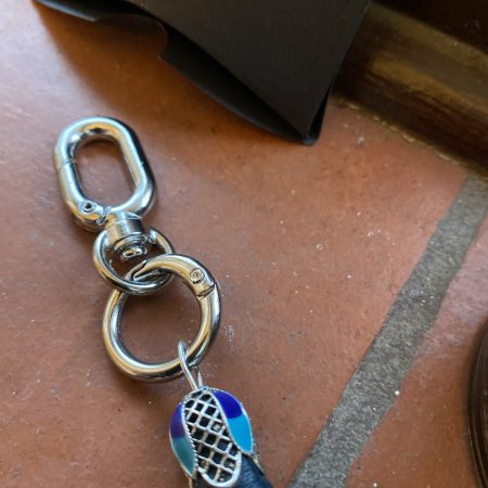 Bag Charm/ tassel handmade Italian leather with stunning enamel and tibetan silver topper