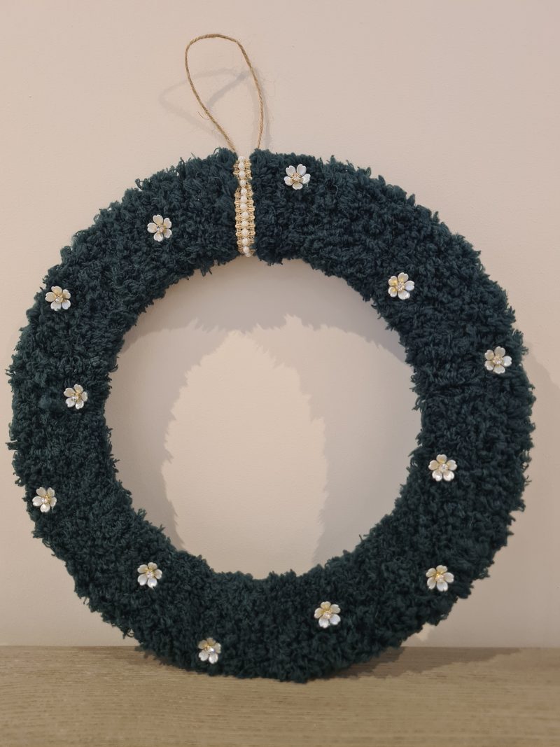 Dark green yarn wrapped wreath