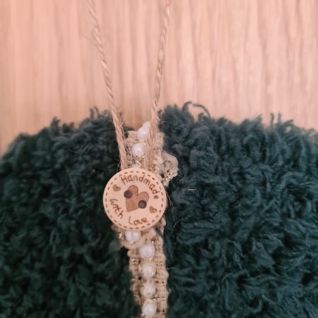 Dark green yarn wrapped wreath