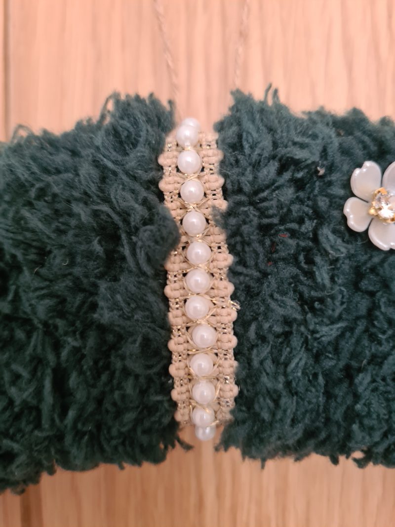 Dark green yarn wrapped wreath