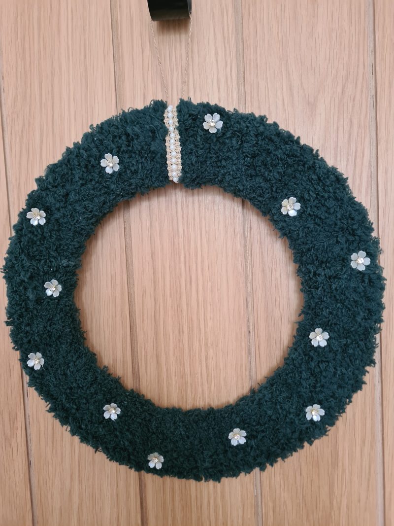 Dark green yarn wrapped wreath