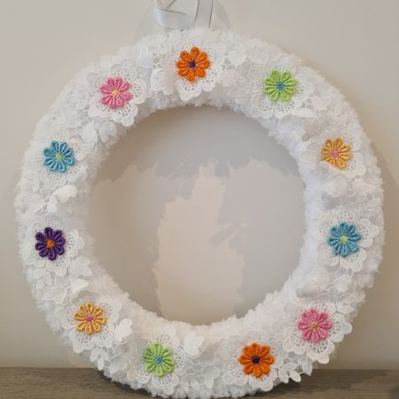 Fluffy white yarn wrapped wreath