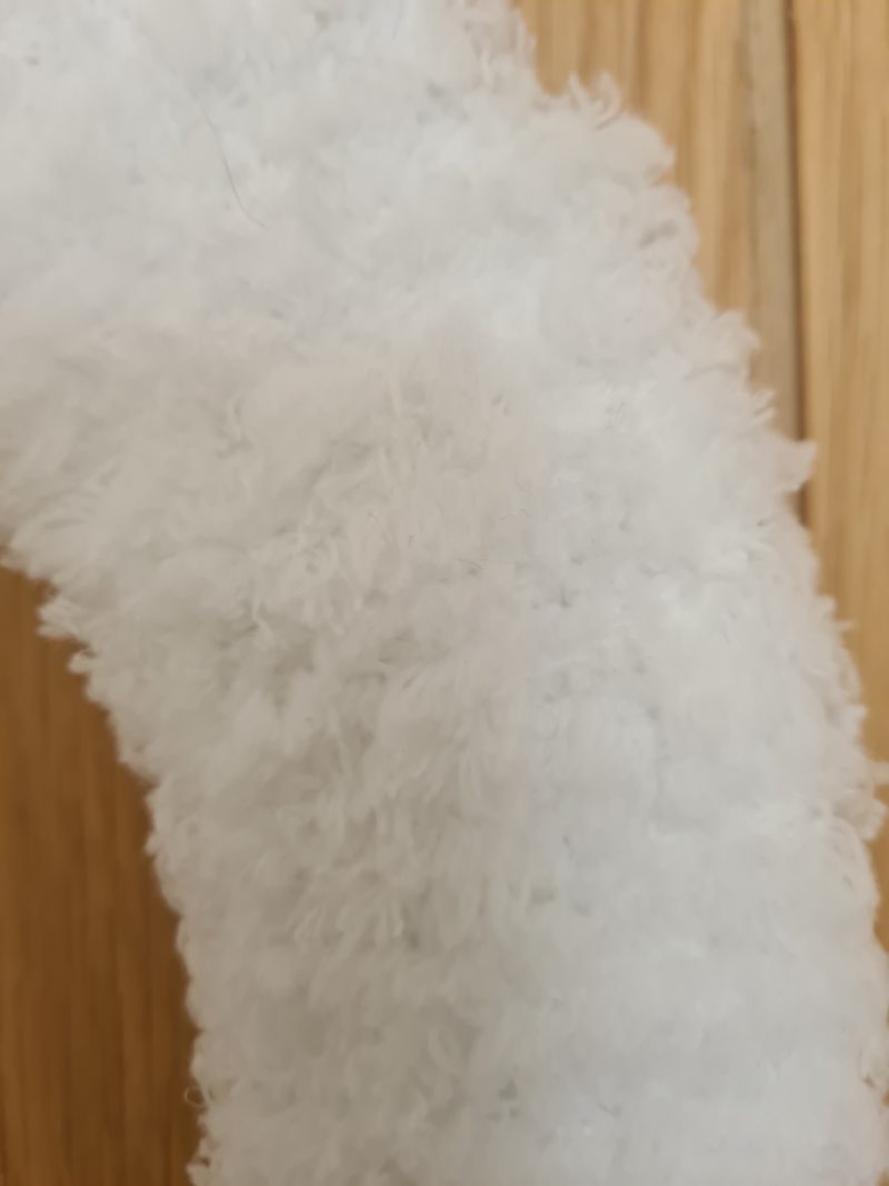 Fluffy white yarn wrapped wreath