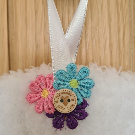 Fluffy white yarn wrapped wreath