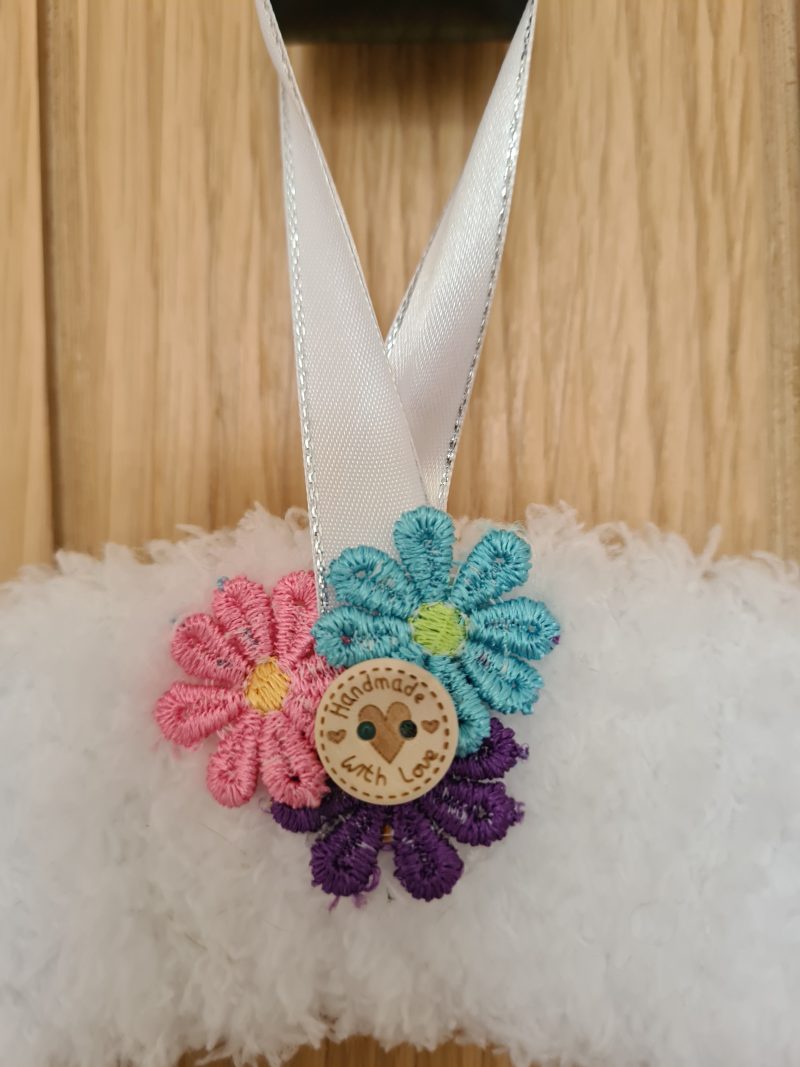 Fluffy white yarn wrapped wreath