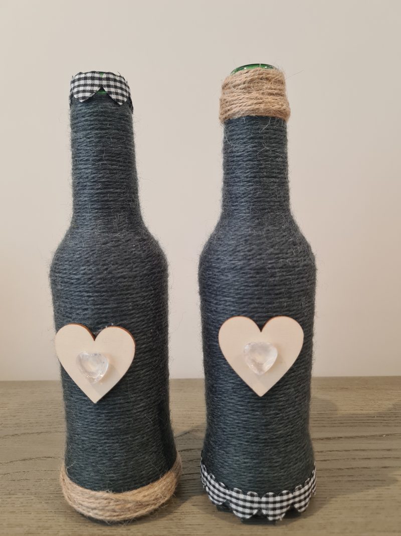 Dark grey yarn wrapped bottles
